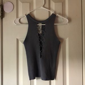 fitting grey tank top, crossed open front